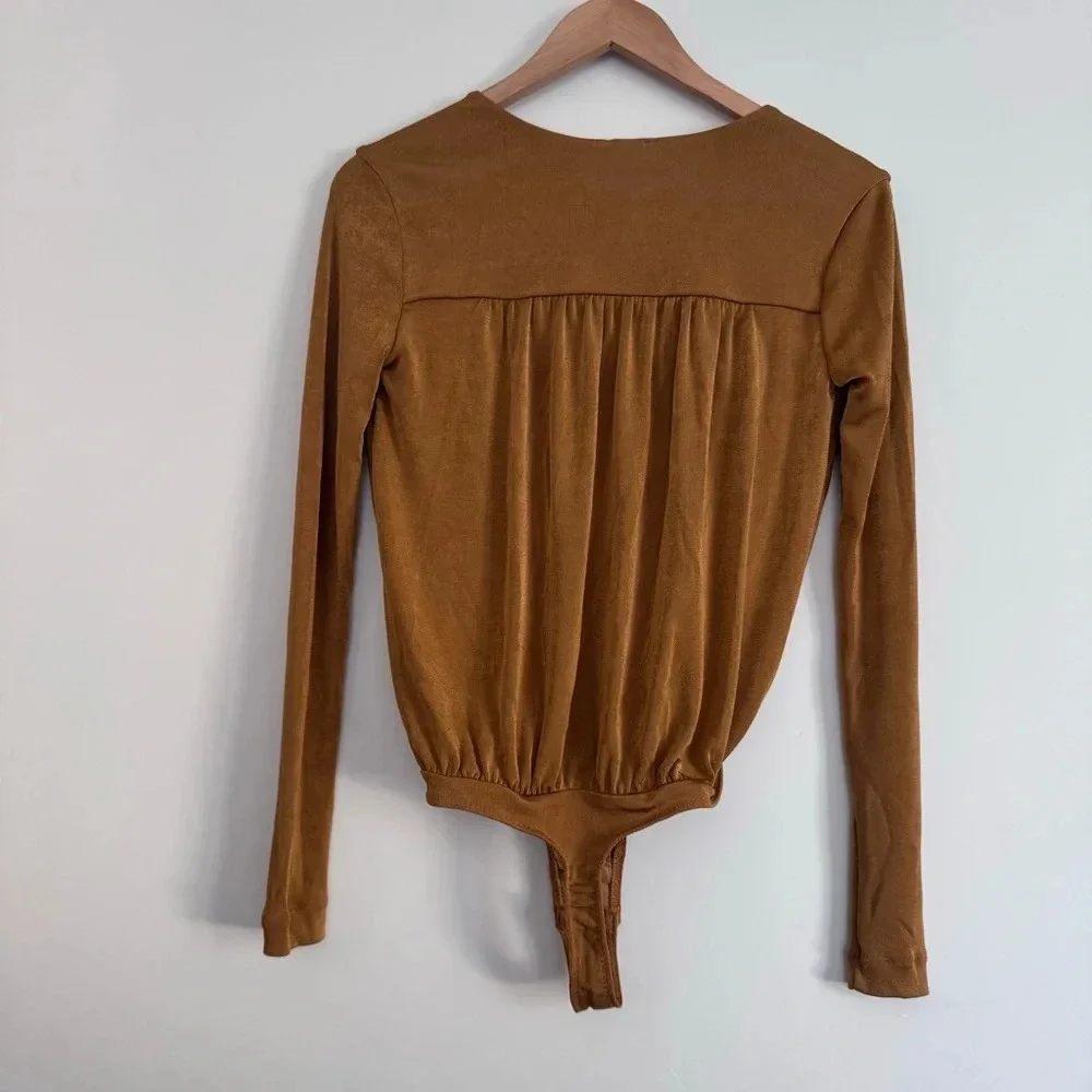Free People Turnt Bodysuit in Honey Ginger Size: XS